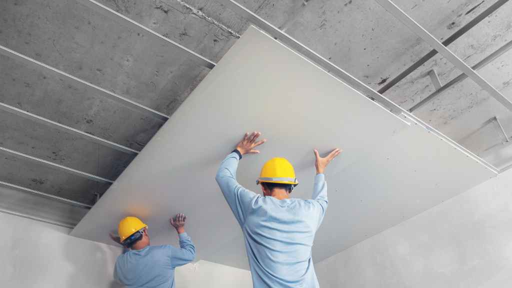 What materials are used in drywall construction