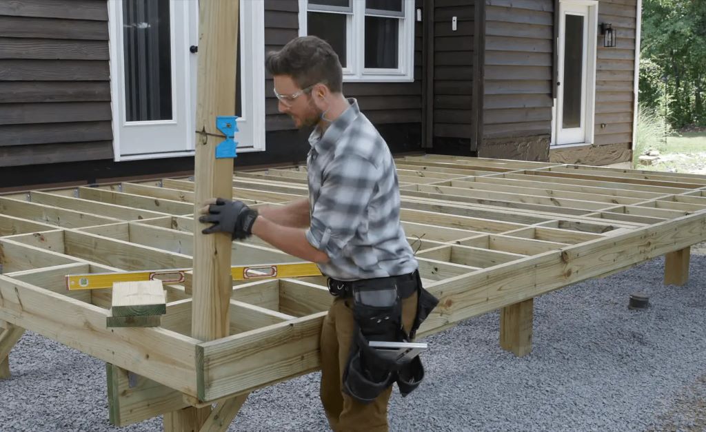 How do you secure a 4x4 deck railing post