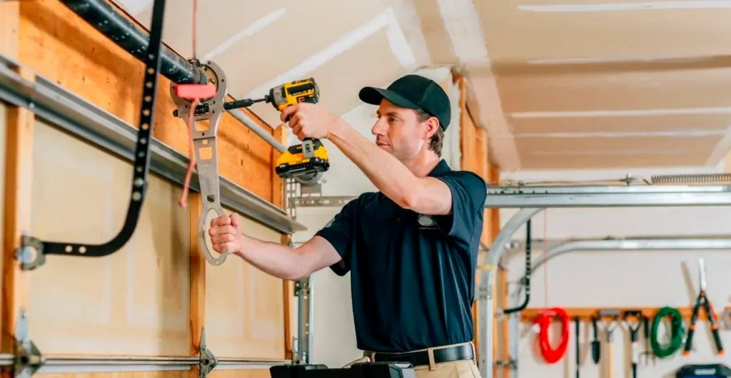 Professional technician adjusting garage door auto-reverse mechanism settings using calibrated testing equipment